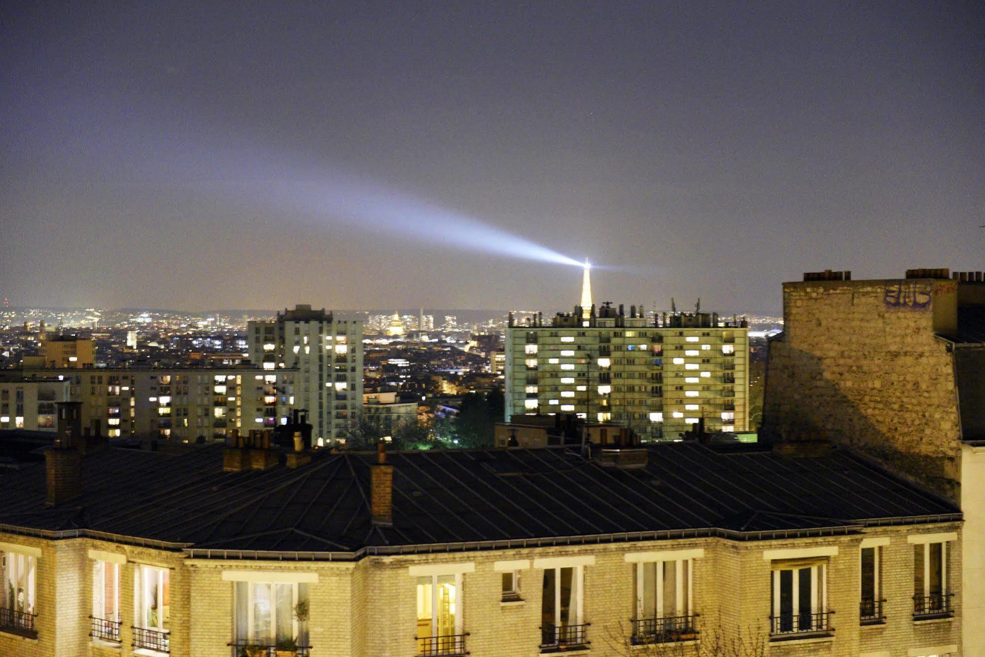Hotel Ermitage Paris Eksteriør billede The Eiffel Tower's searchlight